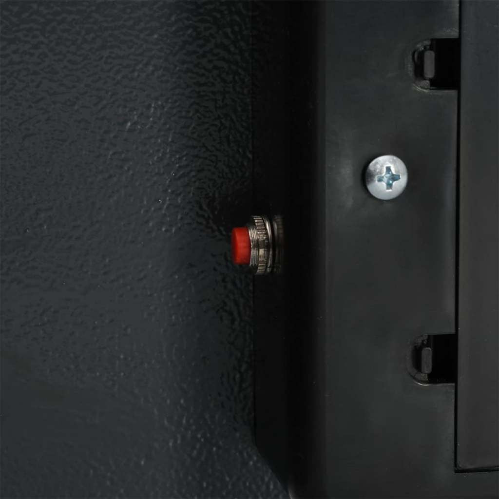 Détail du bouton de réinitialisation rouge sur le coffre-fort numérique en acier gris foncé de Mon Rempart