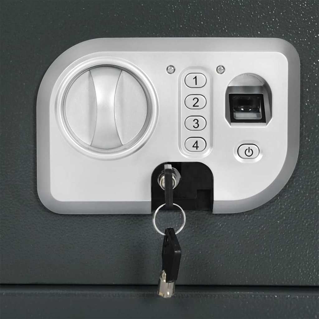 Panneau de contrôle Mon Rempart d'un coffre-fort en acier gris foncé avec lecteur d'empreinte, clavier numérique et clé